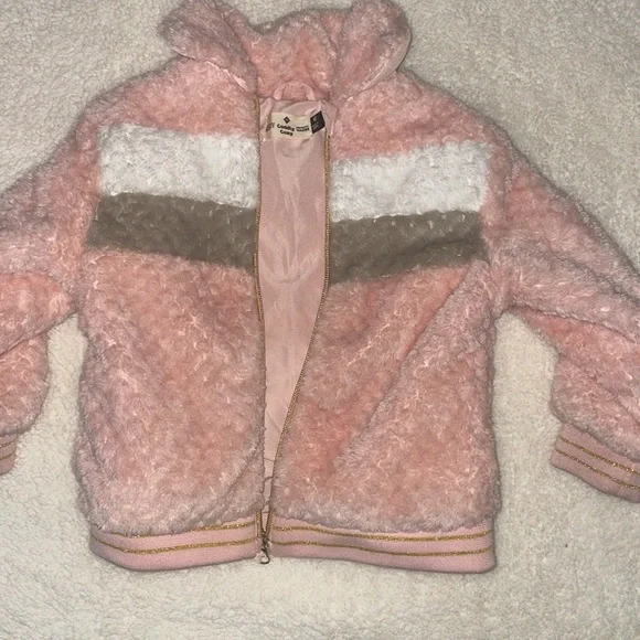 Excellent condition furry, cozy zip up jacket.