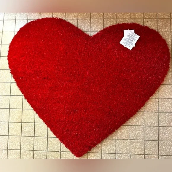 Darling heart shaped coir doormat! 24” across 18” down. NWT