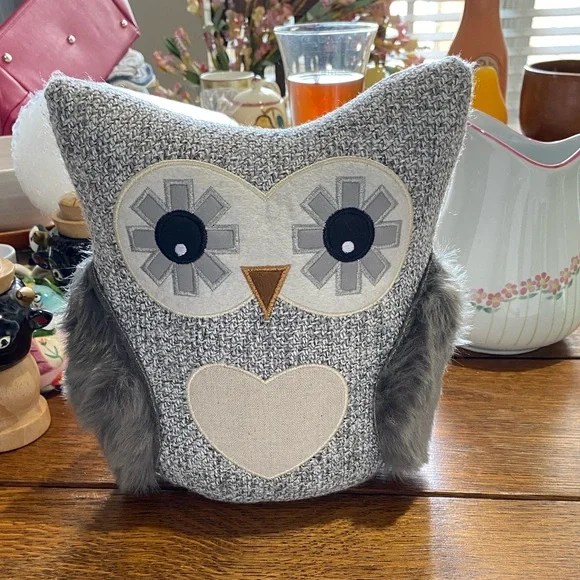 This is an Elements Weighted Fabric Owl Door Stopper. NWOT. 9 inches tall.