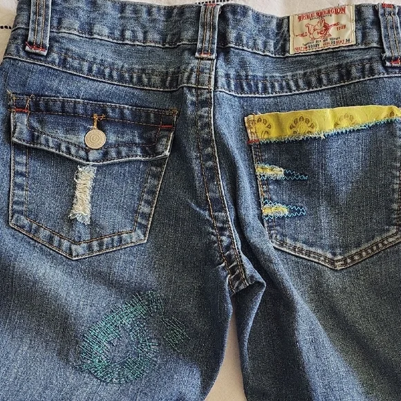 True Religion Denim Jeans With Yellow Accent Pocket. Row 29 Seat 34