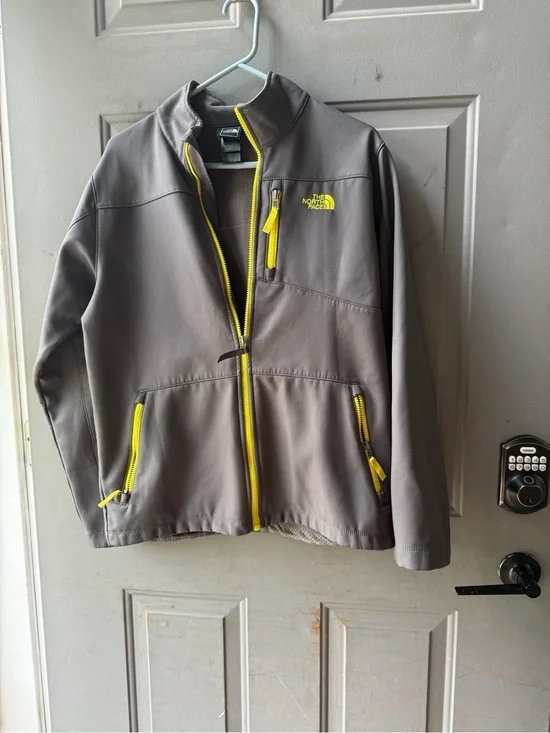 The North Face Gray Softshell Jacket with Yellow Zippers