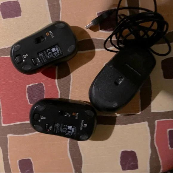 Four computer mice different brands and styles