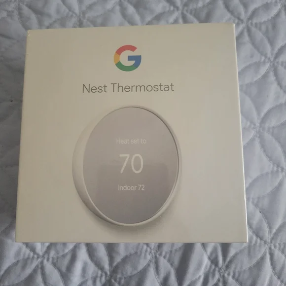 Google Nest Thermostat - Sleek White Design
