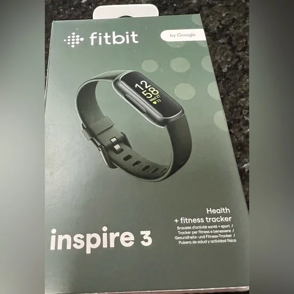 Fitbit by Google. Black band. Duplicate gift, never opened or used.