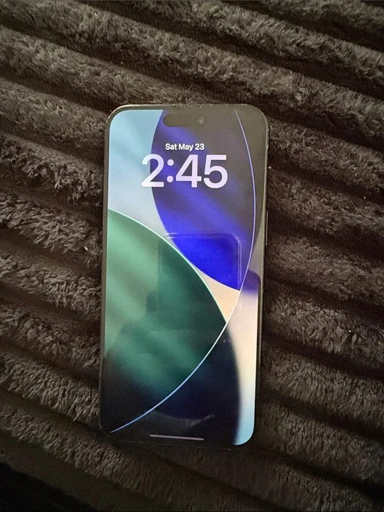 Apple iPhone in Black with Blue-Green Display Accent