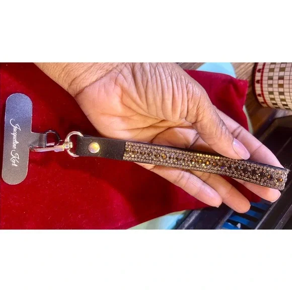 Jacqueline Kent cognac brown phone lanyard