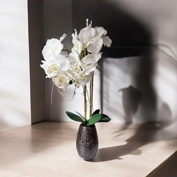 artificial white Phalaenopsis orchid arrangement in a brown textured vase 27”….
