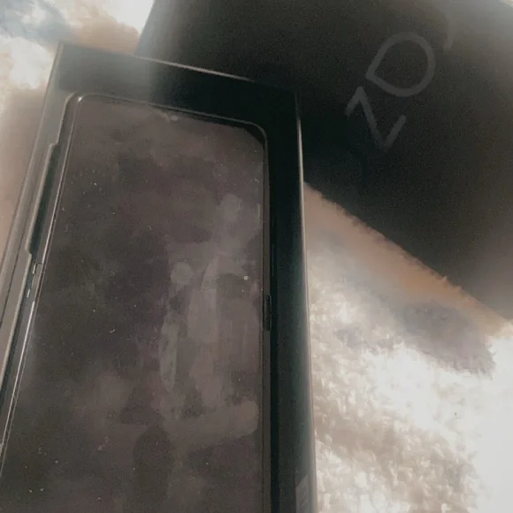 Motorola Black Smartphone with Black Box
