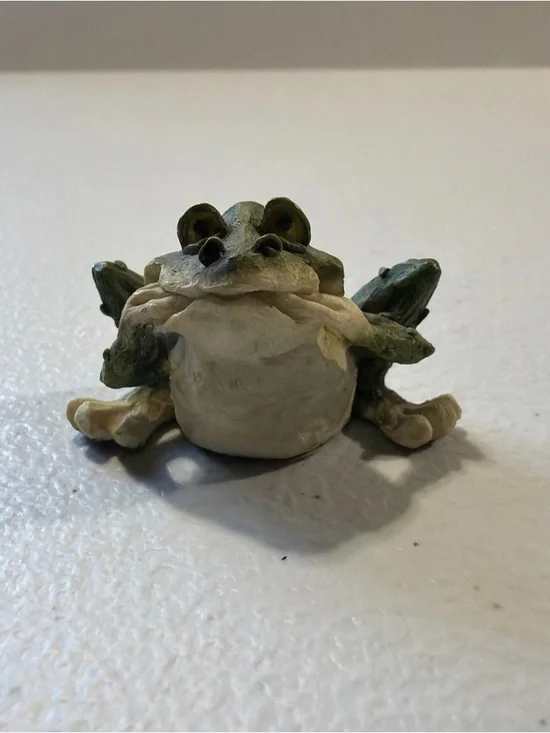 Porcelain Frog Statue 1 inch tall With A Goofy Look On His Face