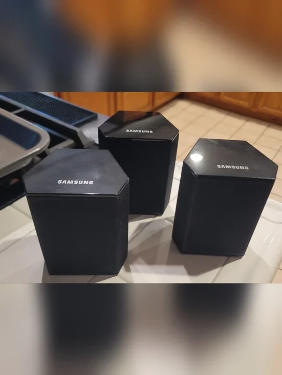 black Samsung PS-FS1-1 surround sound speakers