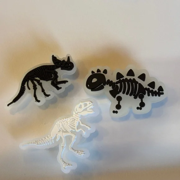 Glow in the dark crocs charms dinosaurs