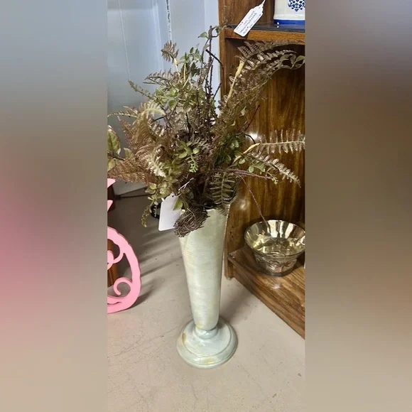 Faux greenery with metal stand