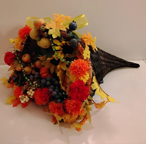 Autumn Harvest Cornucopia with Vibrant Accents Berries Leaves Beads Ribbons