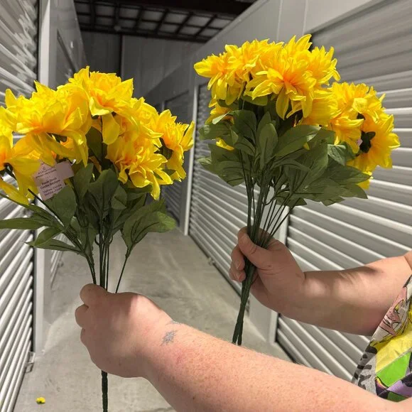3 stems of yellow flowers