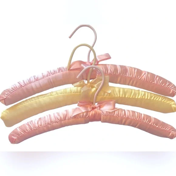 Three Luxurious Padded Satin Hangers-2 Pink and 1 Yellow Hanger.
