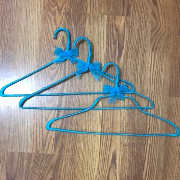 3 yarn covered hangers