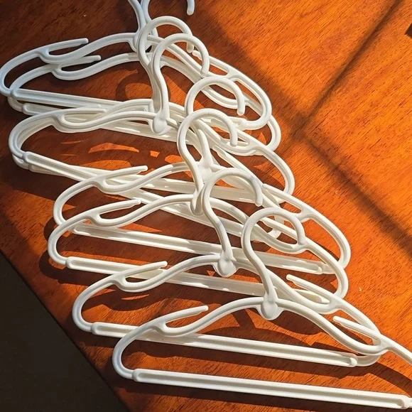9 Plastic White Baby Hangers -VGUC
