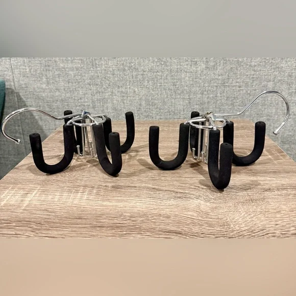 Set of 2, swivel belt hanger. Heavy padded hooks. With 4 small & 4 large hooks