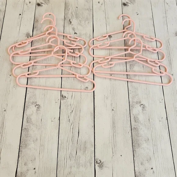 Kids Set of 9 Pink Clothes hangers.