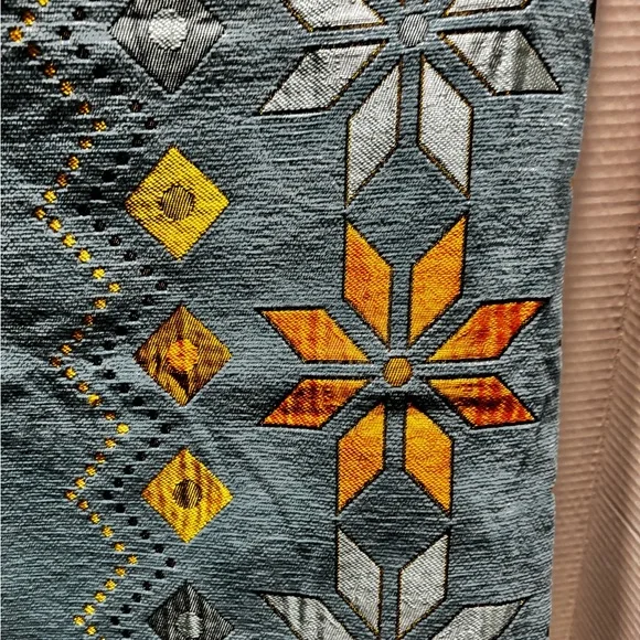Geometric Patterned Textile with Yellow and Orange Accents Couch cover