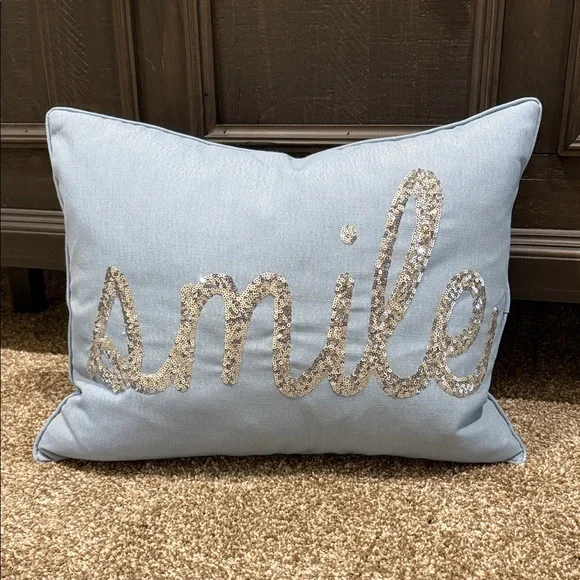 Blue Decorative Pillow with Silver 'Smile' Design