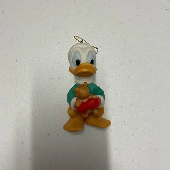Disney Donal duck Santa holding teddy bear porcelain ornament