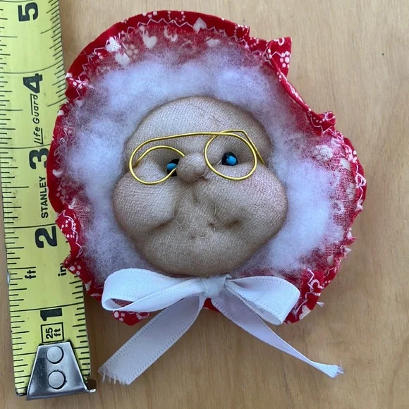 Vintage Mrs. Claus Face Ornament with‎ Gold Glasses and blue eyes, red bonnet