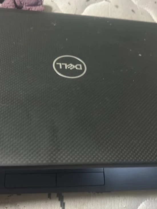 Dell Black Textured Laptop with Silver Logo