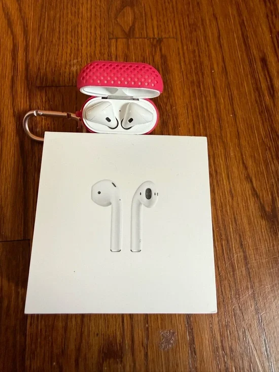 Apple Wireless Earbuds with Hot Pink Silicone Case and Carabiner
