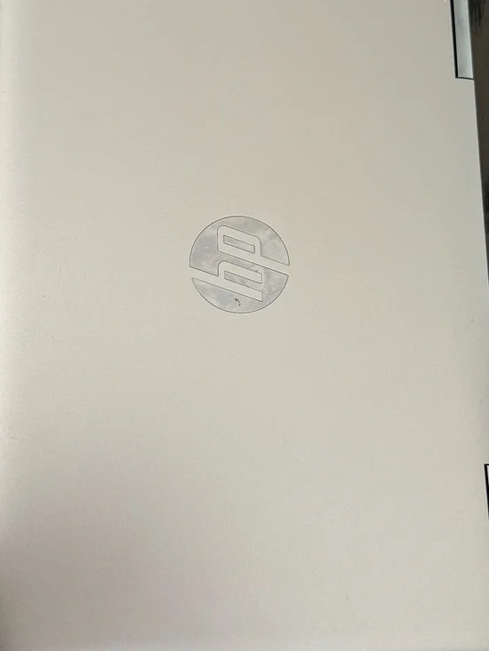 HP Silver-White Laptop with Center Logo