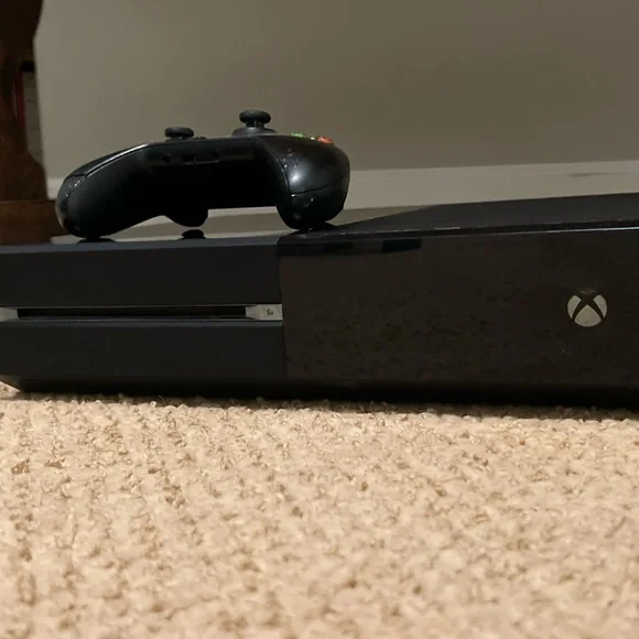 Xbox one with all power cords and everything that came with it and 9 video games