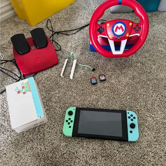 Limited edition animal crossing Nintendo switch. With racing wheel included