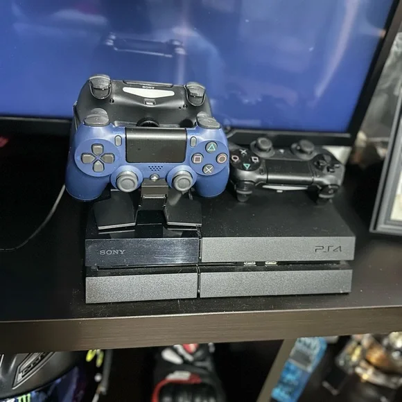 Sony PS4 Console with Black and Blue Controllers