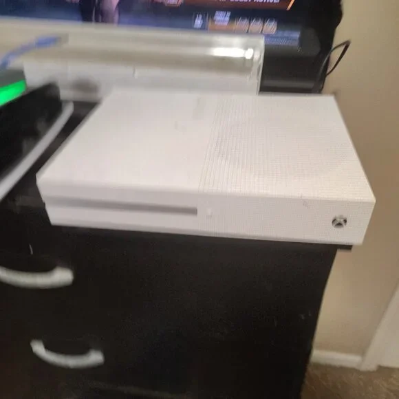 Xbox one s, 29 games, and 2 controllers