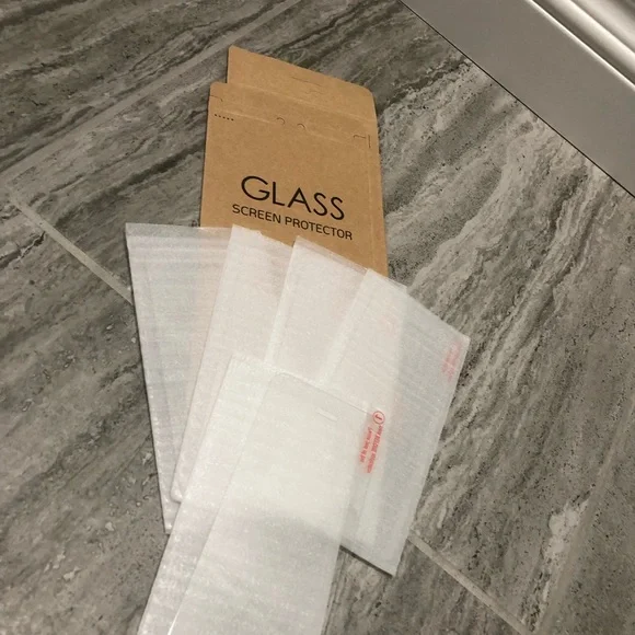 iPhone 5s glass screen protector’s five pack with one packaging box