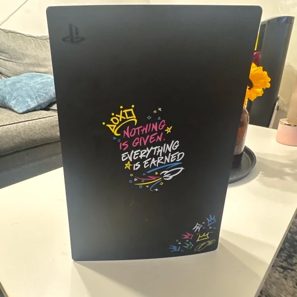 Sony Black Console with Vibrant Graphics