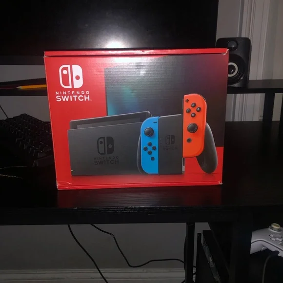 Nintendo Switch Console with Vibrant Blue and Orange Joy-Con