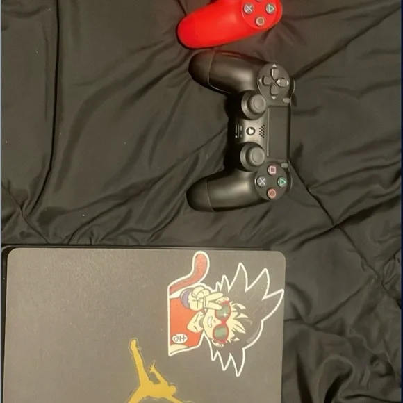 Black and Red Gaming Console with Controllers With Wired Headset