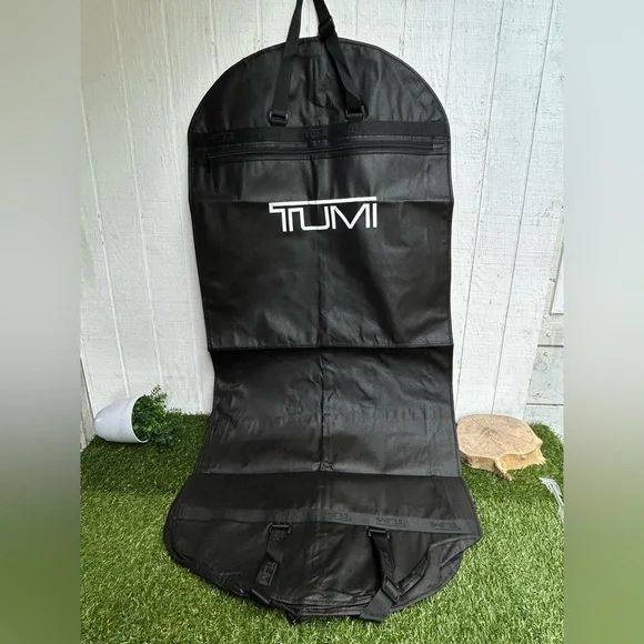 Tumi Travel Garment Bag black suits and dresses, during travel NEW 52” long 23”