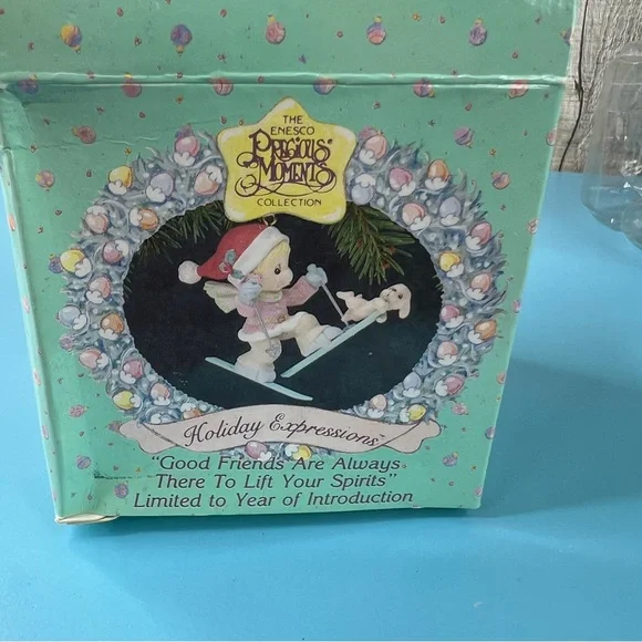 The Enesco Precious Moments Skating Friends (Flawed with A Broken Hand(photos)