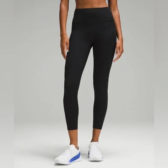 black Lululemon Fast and Free High-Rise Athletic Leggings, likely the 25