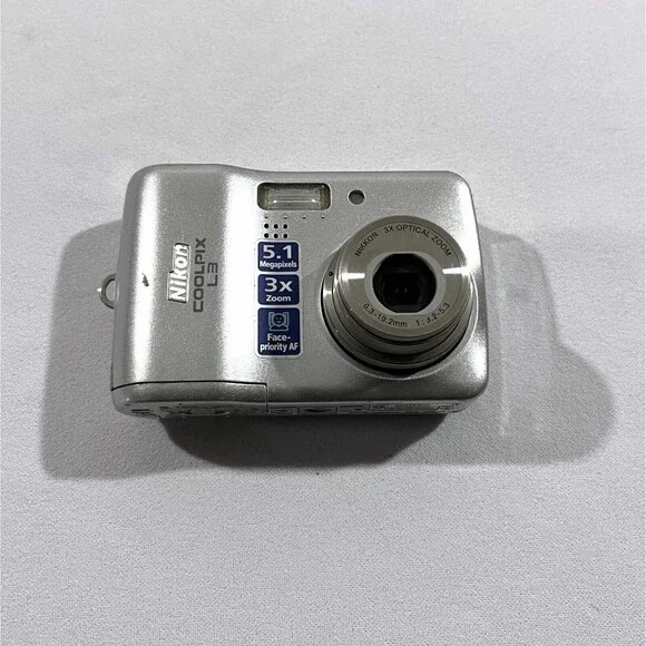 Nikon Coolpix L3 5.1MP Digital Camera 3x Optical Zoom PARTS REPAIR TURNS ON
