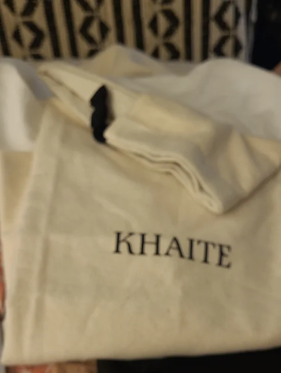 KHAITE Cream Canvas Logo Dust Pouch with Black Lettering