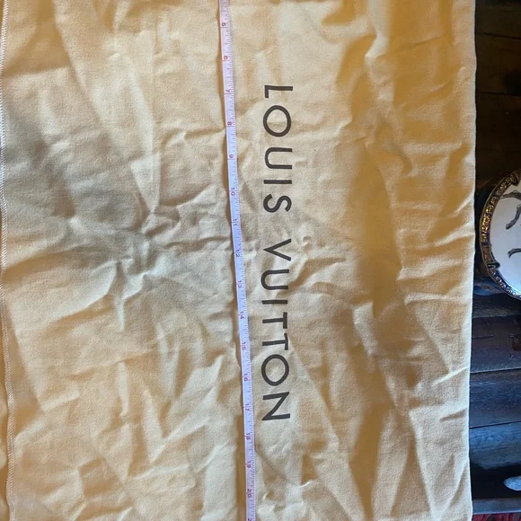 Authentic Louis Vuitton dust cover.