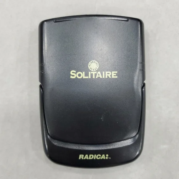 Radica flip top solitaire handheld game