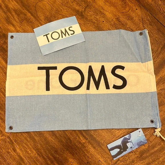 NWT TOMS Dust Cover Bag and Sticker