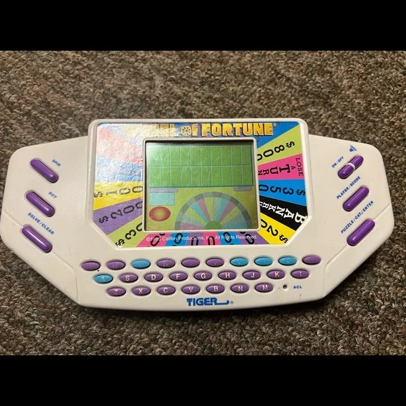 Tiger Electronics Wheel of Fortune Handheld Video Game - EUC
