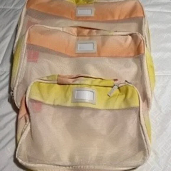 Calpak Cream and Yellow Storage & Organization