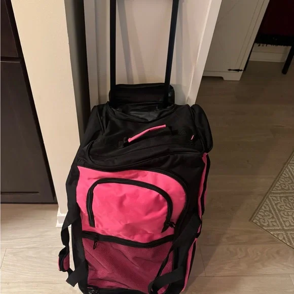 Pink and Black Garment Bag with Wheels 30” long• 16” wide• 14” high