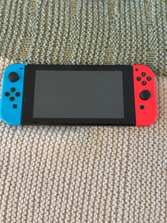 Nintendo Switch with Blue Left and Red Right Joy‑Con